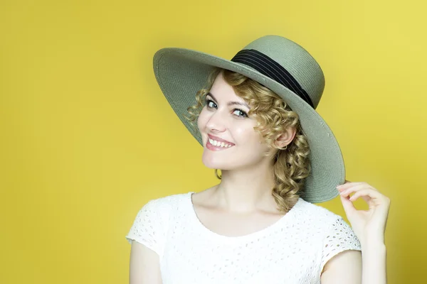 Woman in white dress and hat — Stock Photo, Image