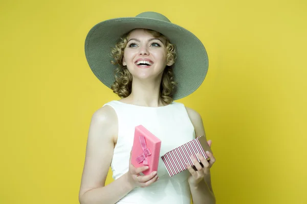 Woman in white dress and hat — Stock Photo, Image