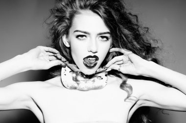 Bright young girl with slice of cheese