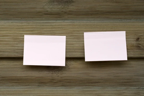 Memo sticks on wooden wall — Stock Photo, Image