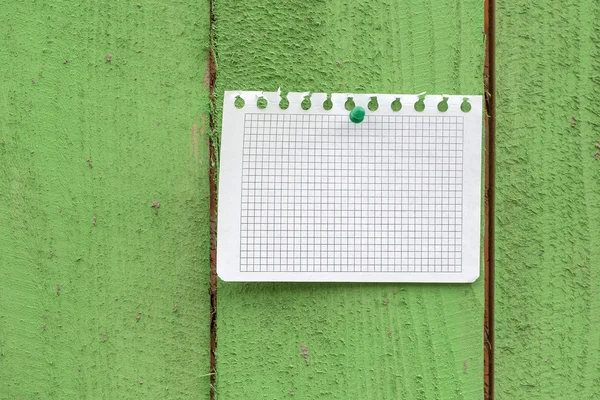 Memo stick on wooden fence — Stock Photo, Image