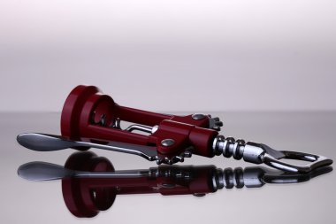 Bottle opener on grey background