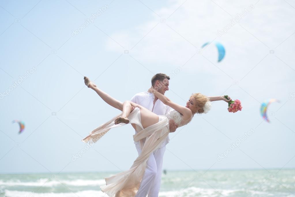 Pretty wedding pair on beach