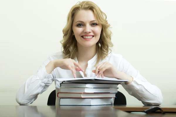 Smiling student with books — Stock Photo, Image