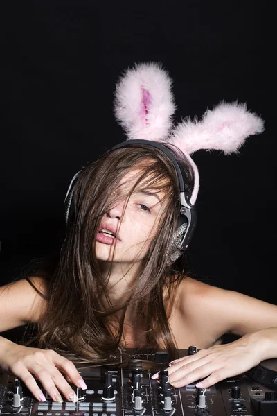 Sexy disk jockey girl with bunny ears — Stock Photo, Image