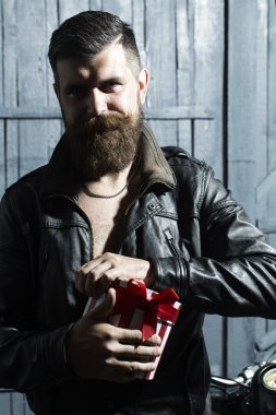 Cool man with present box