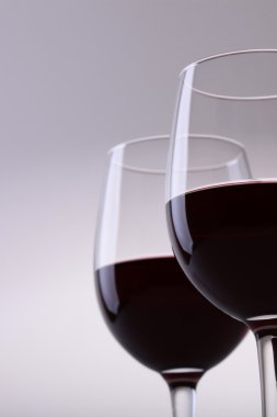 Closeup of two glasses with red wine 