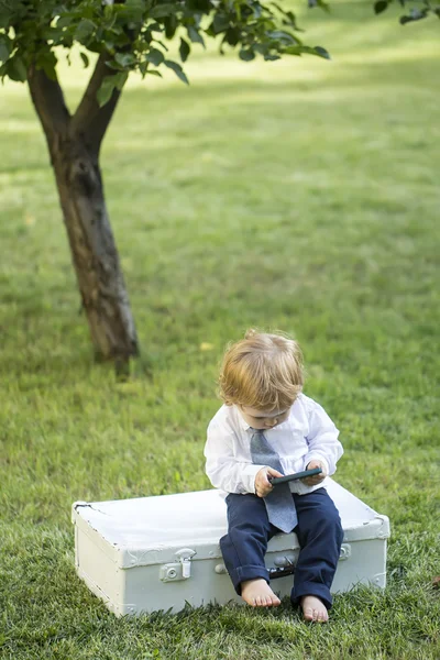 Little baby boy with vintage briefcase — ストック写真