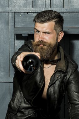 Brutal biker with bottle