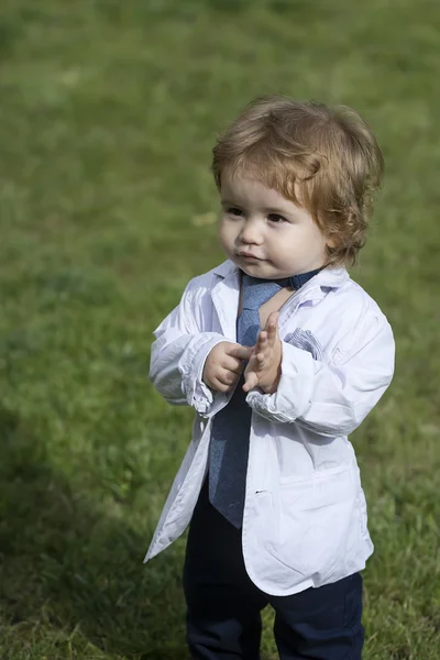 Small baby boy in unbuttoned shirt — Stock Photo, Image