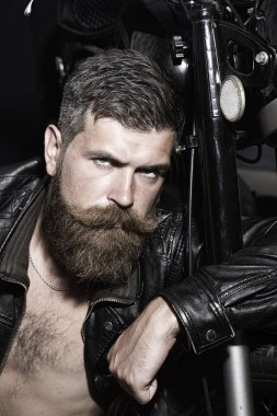 Serious sexy unshaven man