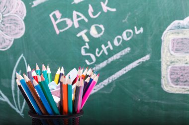 School stationary and blackboard