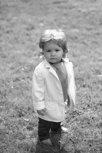 Beautiful baby boy in unbuttoned shirt — Stock fotografie