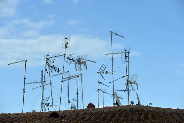 Many antennas on roof — Stock fotografie