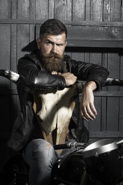 Unshaven man with skull