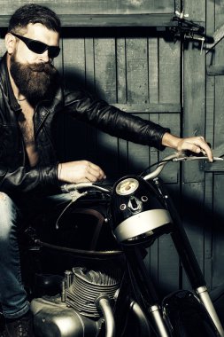 Cool biker in glasses