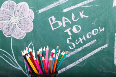 School stationary and blackboard