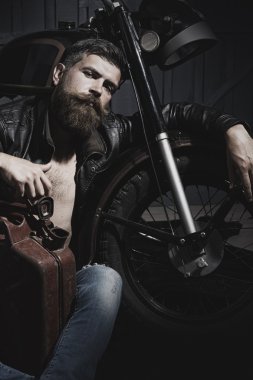 Handsome man with fuel can