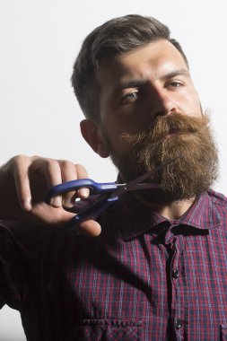 Isolated on white man with scissors