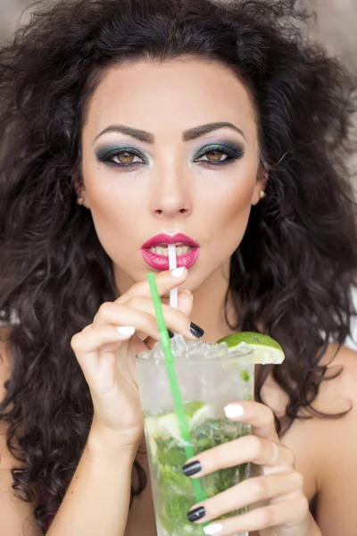 Sexy woman drinking mojito — Stock Photo, Image