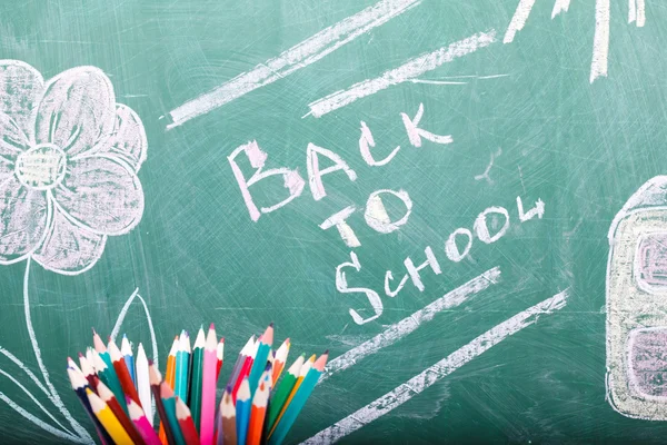 School stationary and blackboard