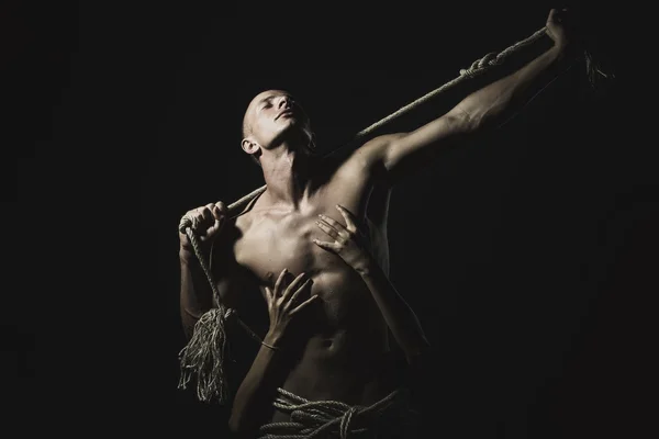 Homem com corda e senhora — Fotografia de Stock