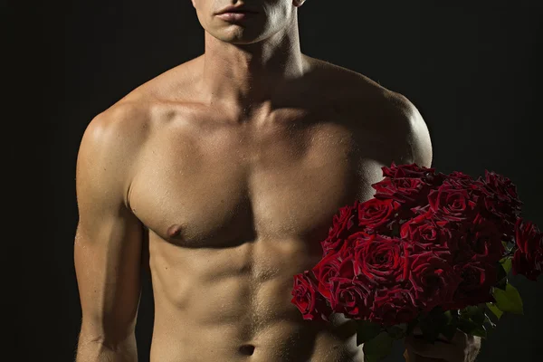 Uomo con bouquet di rose — Foto Stock