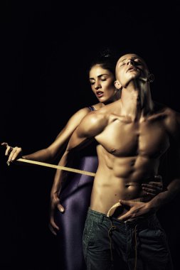 Couple and tape measure
