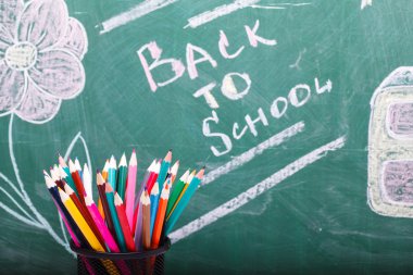 School stationary and blackboard