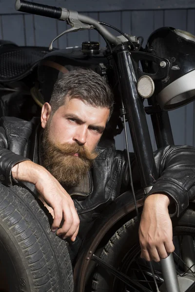 Serious man with wheel — Stok fotoğraf