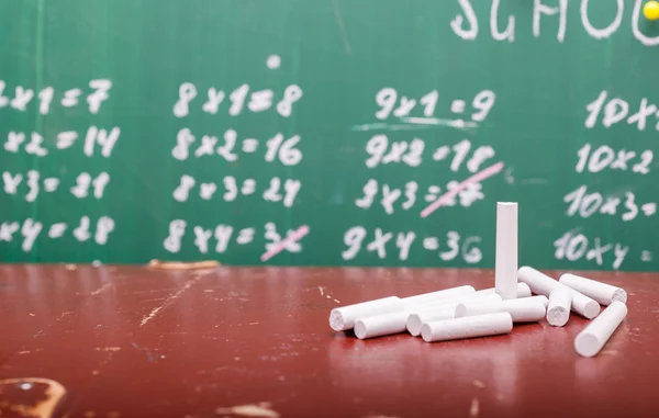 School blackboard and chalk — Stockfoto