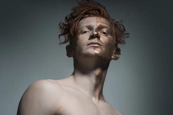 Stylish man with bronze face — Zdjęcie stockowe
