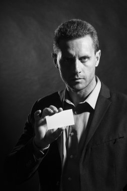 Attractive man with card