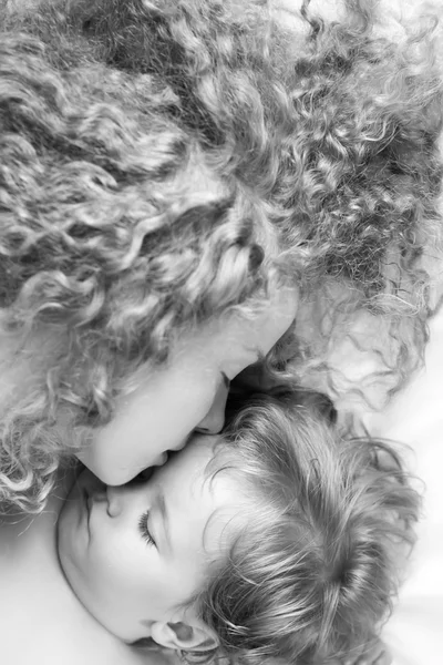 Mother kissing baby — Stock Photo, Image