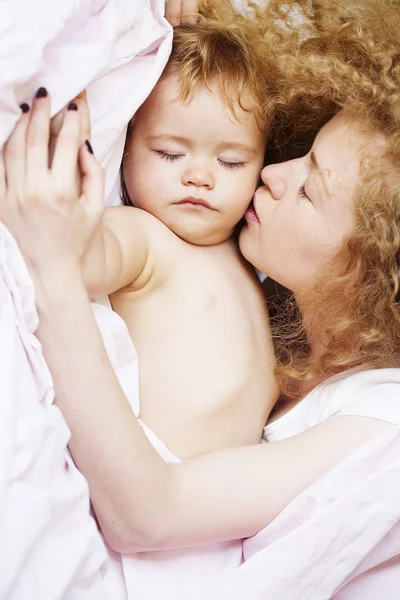 Mother kissing baby — Stock Photo, Image