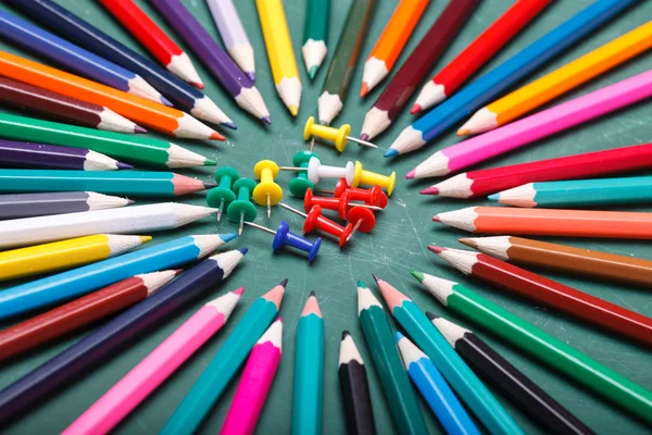 Pencils around pins — Stock Photo, Image