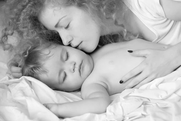 Mother kissing baby — Stock Photo, Image