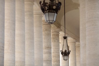 White columns and street lamps