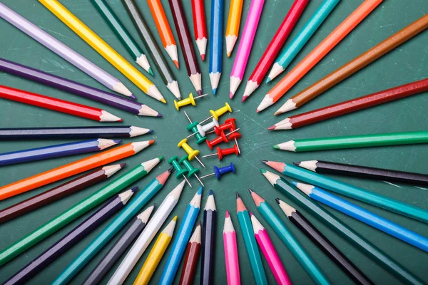 Pencils around pins — Stock Photo, Image