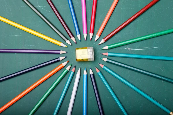 Pencils around sharpener — Stok fotoğraf