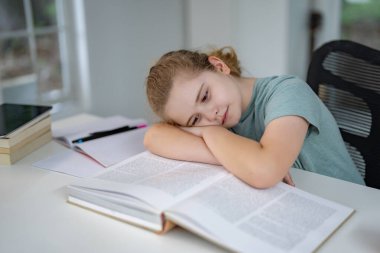 Children reading books. Cute kid read storybook in library. Young student read literature. Child learning at home. Happy boy reading stories. Kids enjoying reading books. Teen studying with books