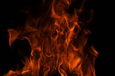 Sancak arka planı için ateş dokusu. Soyut ışıkları yakın. Alev alev yanıyor. Arkaplanı alevler kaplıyor