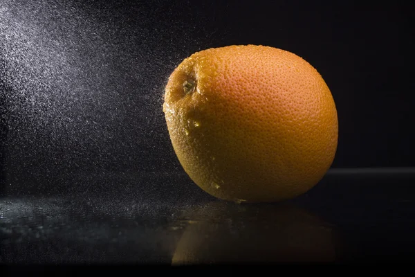 Orange i spray — Stockfoto