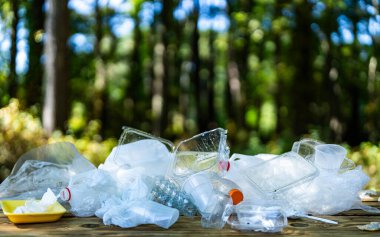 Plastic trash waste is a global problem. Recycling trash waste helps protect the environment. Trash waste nature and wildlife. Recyclable waste reduce pollution. Green planet. Reducing wastes