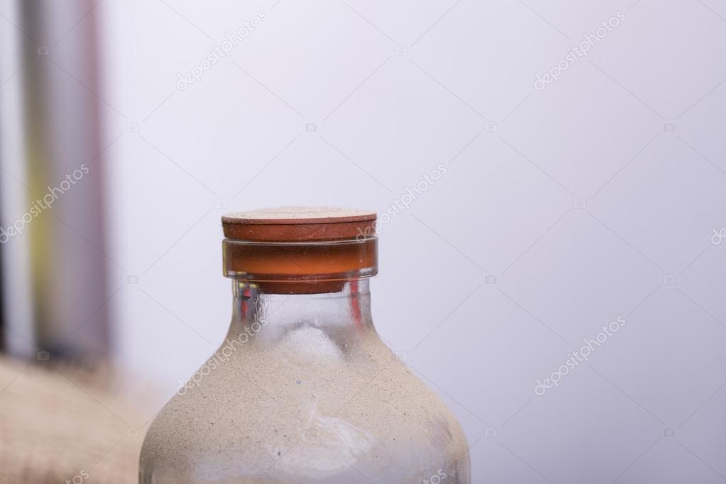 Bottle with sand