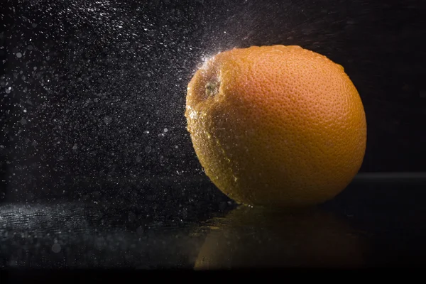 Orange im Spray — Stockfoto