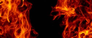 Ateş kıvılcımları. Yangın arka planı. Siyah arka planda yangın. Ateş parlama etkisi