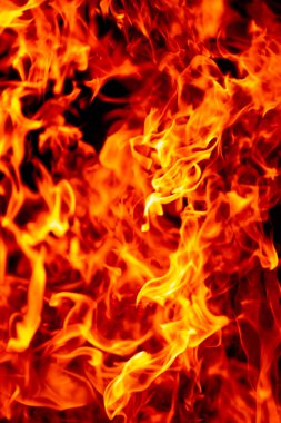 Ateş yakma kavramı. Ateş kıvılcımları. Yangın arka planı. Ateş etkisi