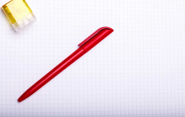 Red pen and sharpener — Stok fotoğraf