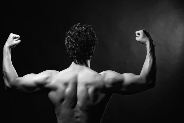 Вид сзади на мускулистого человека Стоковое Фото